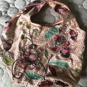 Small decorated pink bag